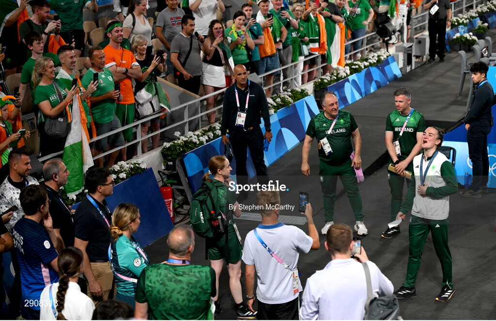 6 August 2024; Kellie Harrington of Team Ireland celebrates with the supporters after defeating Wenlu Yang of Team People's Republic of China in their women's 60kg final boutat Court Philippe-Chatrier in Roland Garros Stadium during the 2024 Paris Summer Olympic Games in Paris, France. Photo by Stephen McCarthy/Sportsfile