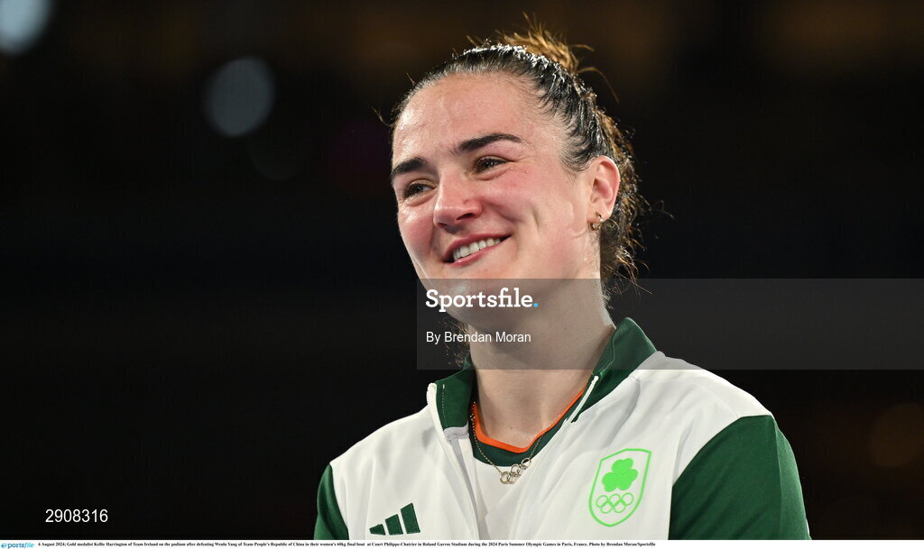 6 August 2024; Gold medalist Kellie Harrington of Team Ireland on the podium after defeating Wenlu Yang of Team People's Republic of China in their women's 60kg final bout  at Court Philippe-Chatrier in Roland Garros Stadium during the 2024 Paris Summer Olympic Games in Paris, France. Photo by Brendan Moran/Sportsfile