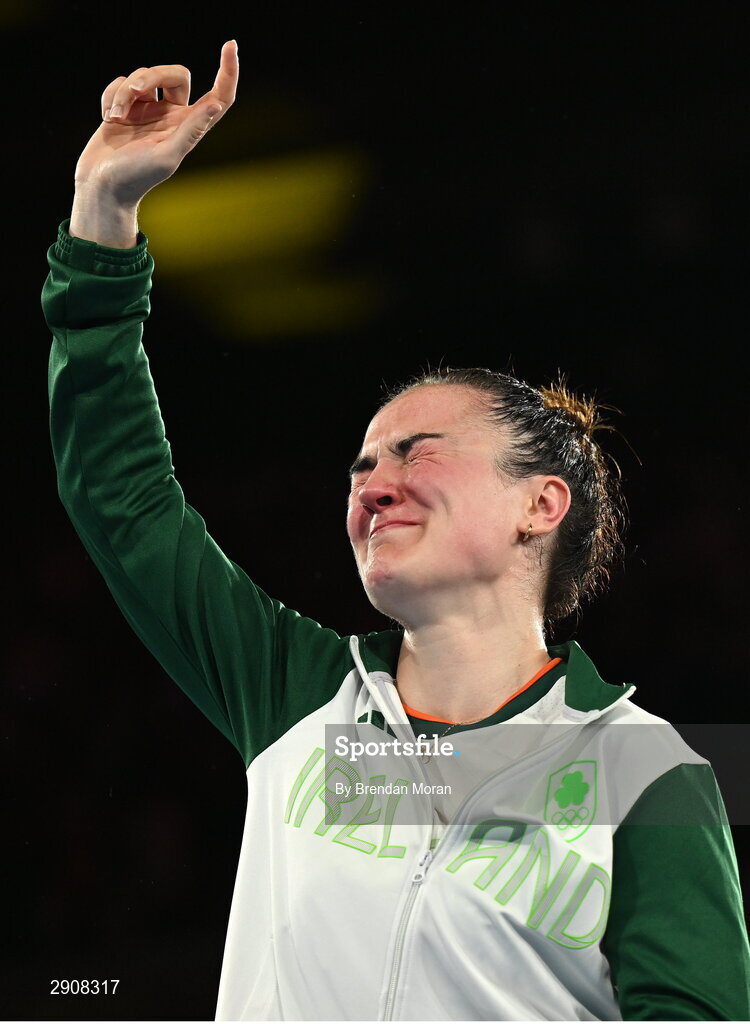 6 August 2024; Gold medalist Kellie Harrington of Team Ireland on the podium after defeating Wenlu Yang of Team People's Republic of China in their women's 60kg final bout  at Court Philippe-Chatrier in Roland Garros Stadium during the 2024 Paris Summer Olympic Games in Paris, France. Photo by Brendan Moran/Sportsfile