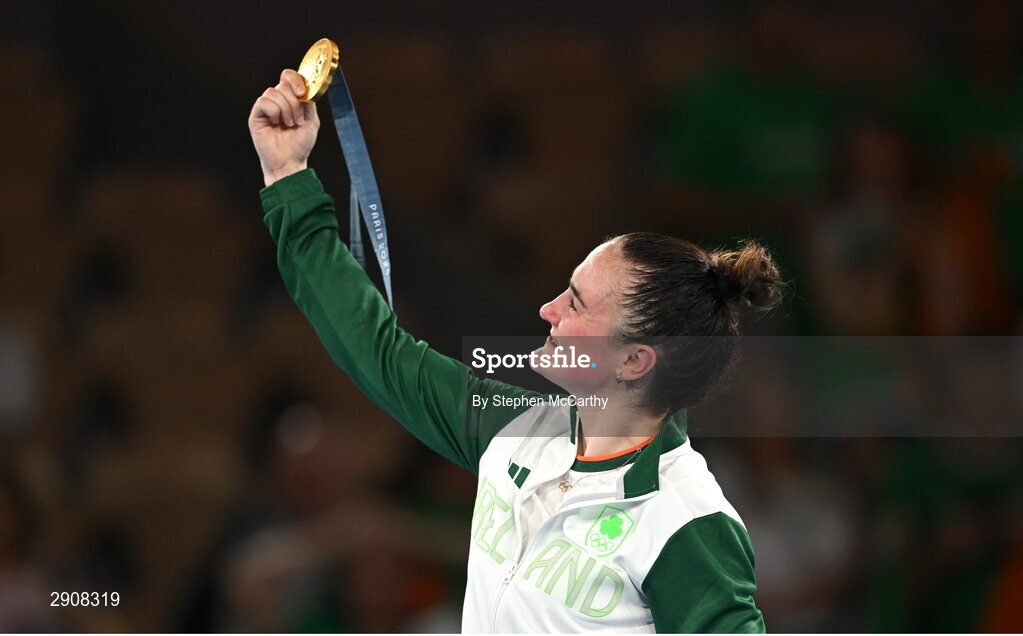 6 August 2024; Kellie Harrington of Team Ireland celebrates with the her gold medal after defeating Wenlu Yang of Team People's Republic of China in their women's 60kg final boutat Court Philippe-Chatrier in Roland Garros Stadium during the 2024 Paris Summer Olympic Games in Paris, France. Photo by Stephen McCarthy/Sportsfile