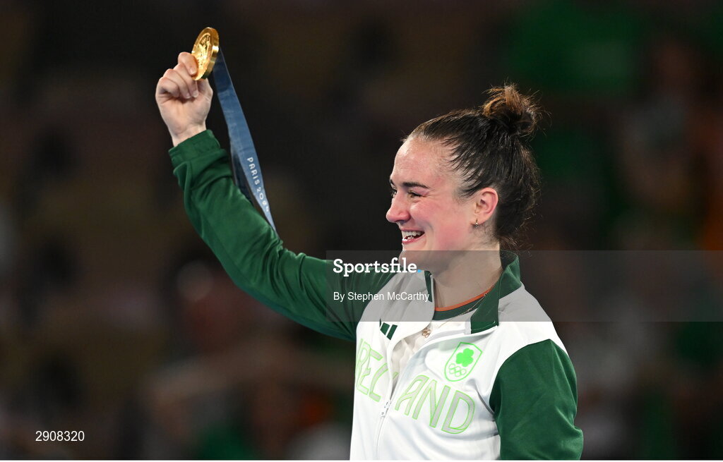 6 August 2024; Kellie Harrington of Team Ireland celebrates with the her gold medal after defeating Wenlu Yang of Team People's Republic of China in their women's 60kg final boutat Court Philippe-Chatrier in Roland Garros Stadium during the 2024 Paris Summer Olympic Games in Paris, France. Photo by Stephen McCarthy/Sportsfile