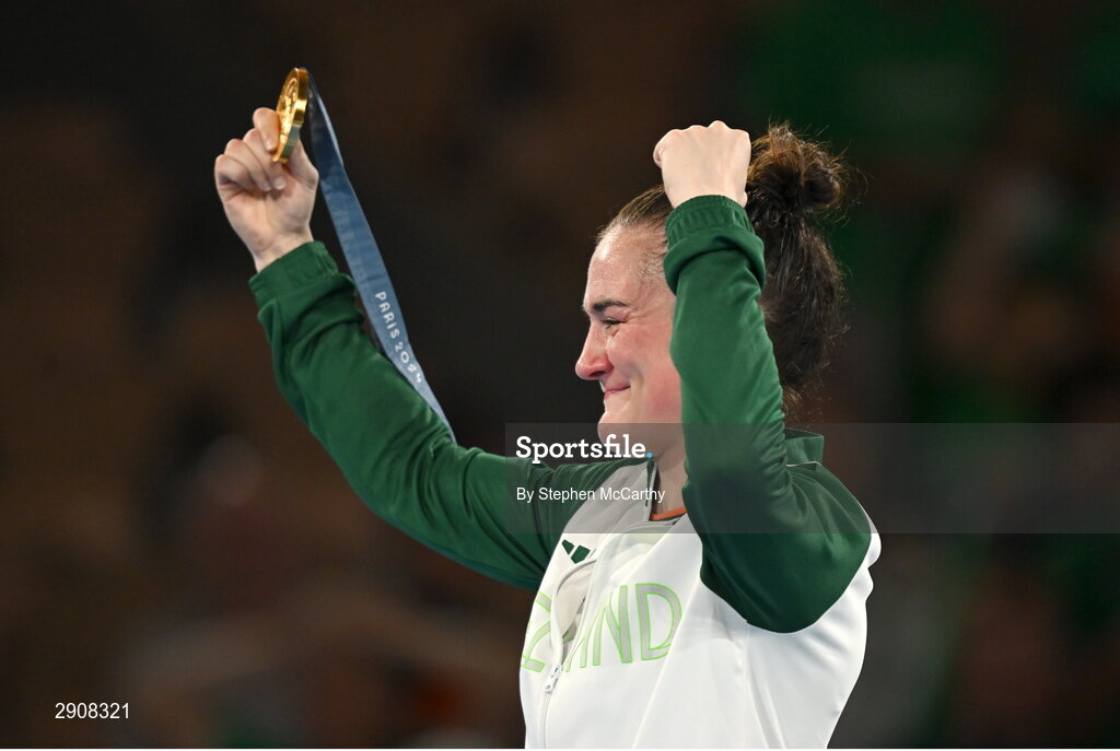 6 August 2024; Kellie Harrington of Team Ireland celebrates with the her gold medal after defeating Wenlu Yang of Team People's Republic of China in their women's 60kg final boutat Court Philippe-Chatrier in Roland Garros Stadium during the 2024 Paris Summer Olympic Games in Paris, France. Photo by Stephen McCarthy/Sportsfile