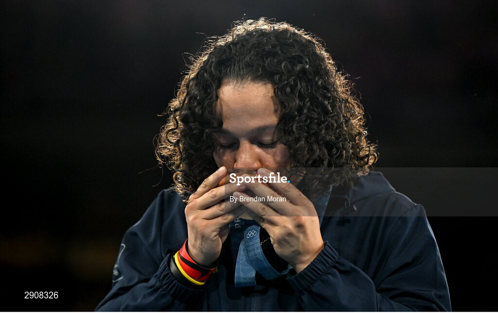 6 August 2024; Women's 60kg bronze medalist Beatriz Soares Ferreira of Team Brazil kisses her medal during the medal ceremony at Court Philippe-Chatrier in Roland Garros Stadium during the 2024 Paris Summer Olympic Games in Paris, France. Photo by Brendan Moran/Sportsfile