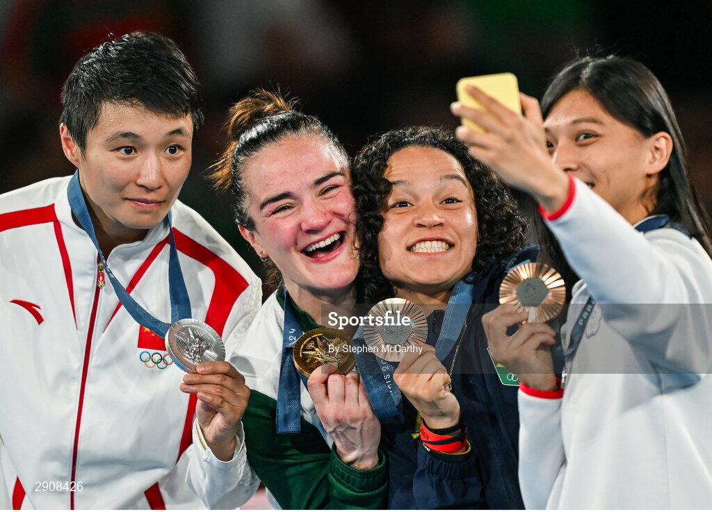 6 August 2024; The women's 60kg podium, from left to right, Silver medalist Wenlu Yang of Team People's Republic of China, Gold medalist Kellie Harrington of Team Ireland, Bronze medalists Beatriz Soares Ferreira of Team Brazil, and Shih Yi Wu of Team Chinese Taipei take a photo at Court Philippe-Chatrier in Roland Garros Stadium during the 2024 Paris Summer Olympic Games in Paris, France. Photo by Stephen McCarthy/Sportsfile