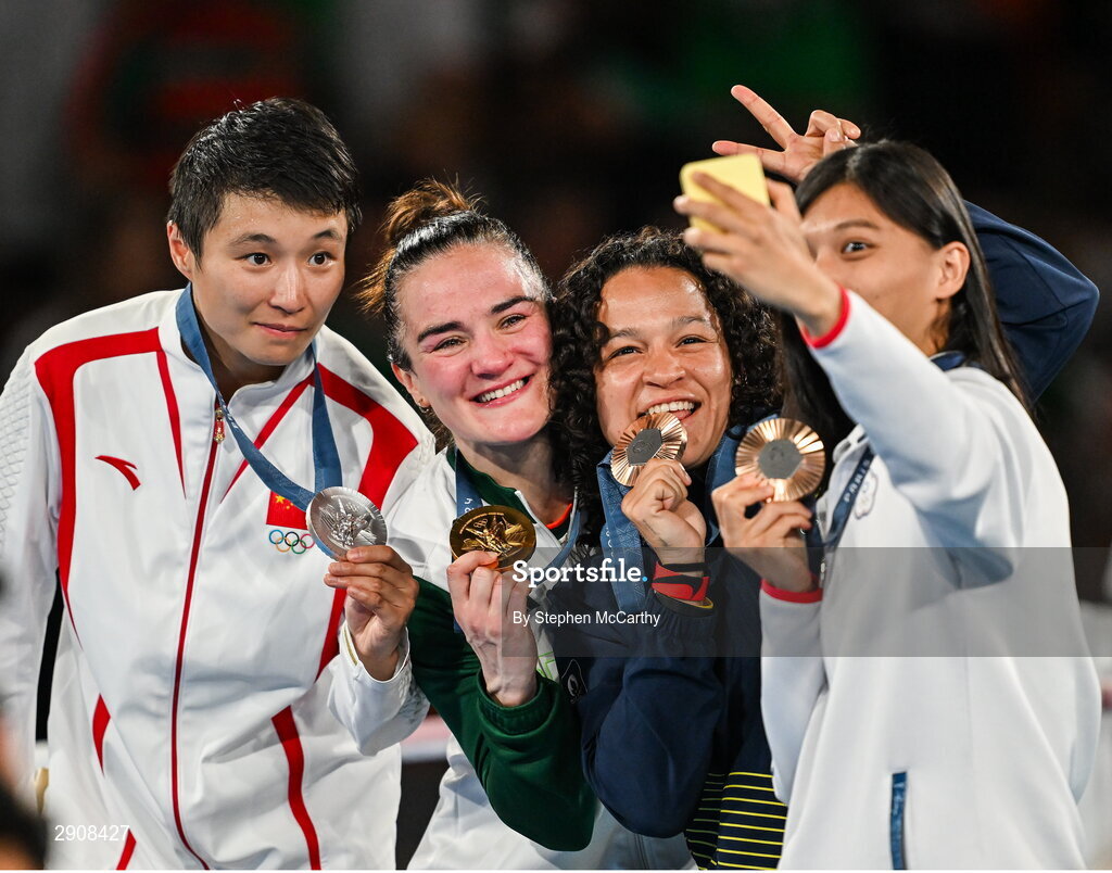 6 August 2024; The women's 60kg podium, from left to right, Silver medalist Wenlu Yang of Team People's Republic of China, Gold medalist Kellie Harrington of Team Ireland, Bronze medalists Beatriz Soares Ferreira of Team Brazil, and Shih Yi Wu of Team Chinese Taipei take a photo at Court Philippe-Chatrier in Roland Garros Stadium during the 2024 Paris Summer Olympic Games in Paris, France. Photo by Stephen McCarthy/Sportsfile