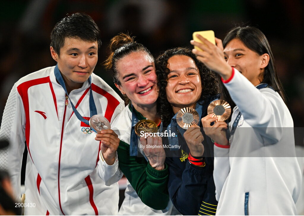 6 August 2024; The women's 60kg podium, from left to right, Silver medalist Wenlu Yang of Team People's Republic of China, Gold medalist Kellie Harrington of Team Ireland, Bronze medalists Beatriz Soares Ferreira of Team Brazil, and Shih Yi Wu of Team Chinese Taipei take a photo at Court Philippe-Chatrier in Roland Garros Stadium during the 2024 Paris Summer Olympic Games in Paris, France. Photo by Stephen McCarthy/Sportsfile