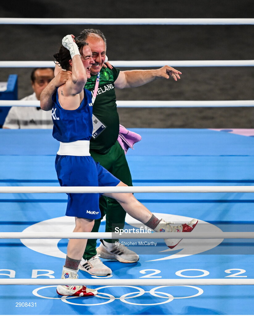 6 August 2024; Kellie Harrington of Team Ireland celebrates with head coach Zaur Antia after winning her women's 60kg final bout against Wenlu Yang of Team People's Republic of China at Court Philippe-Chatrier in Roland Garros Stadium during the 2024 Paris Summer Olympic Games in Paris, France. Photo by Stephen McCarthy/Sportsfile