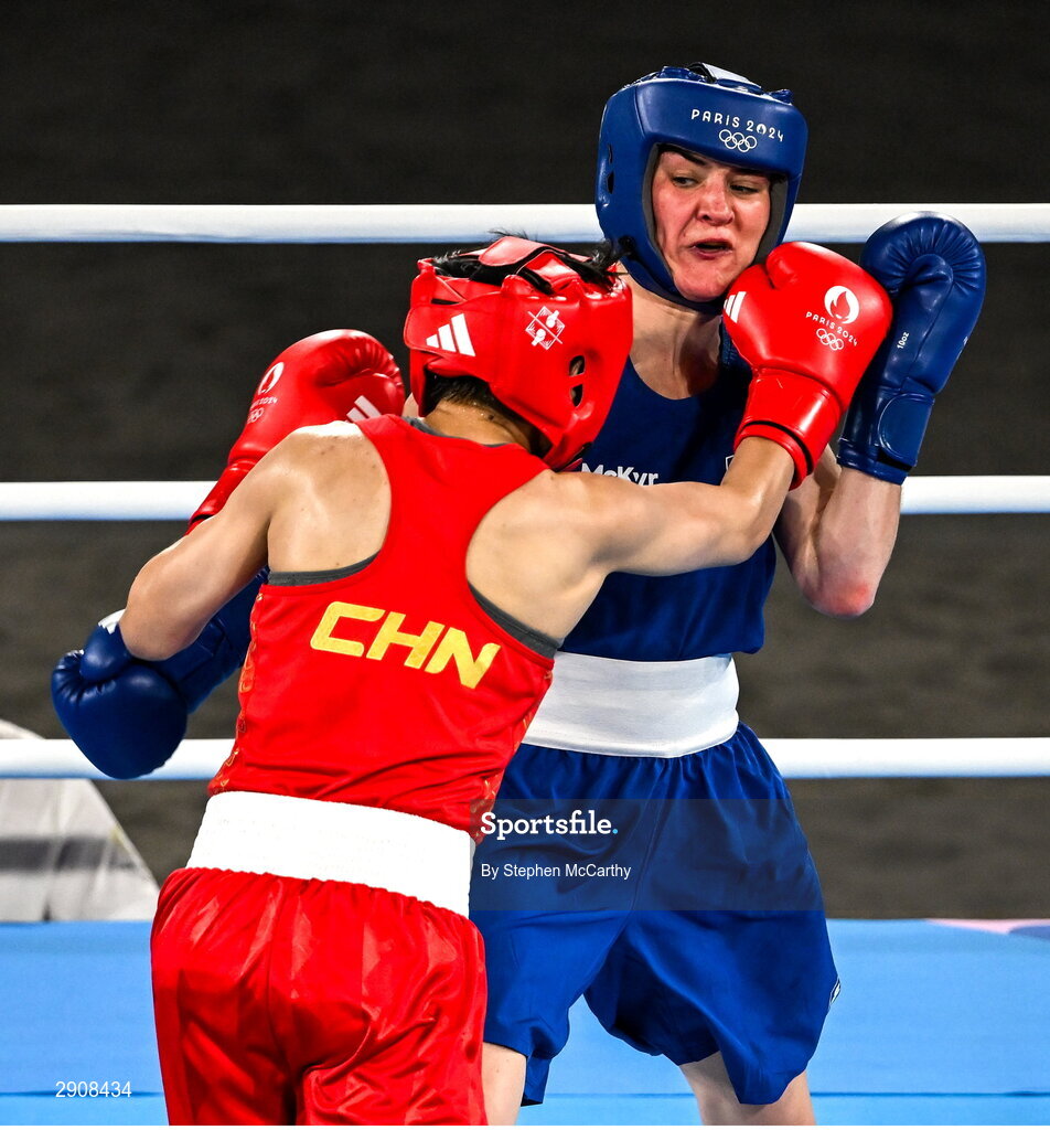 6 August 2024; Kellie Harrington of Team Ireland, right, and Wenlu Yang of Team People's Republic of China during their women's 60kg final bout at Court Philippe-Chatrier in Roland Garros Stadium during the 2024 Paris Summer Olympic Games in Paris, France. Photo by Stephen McCarthy/Sportsfile