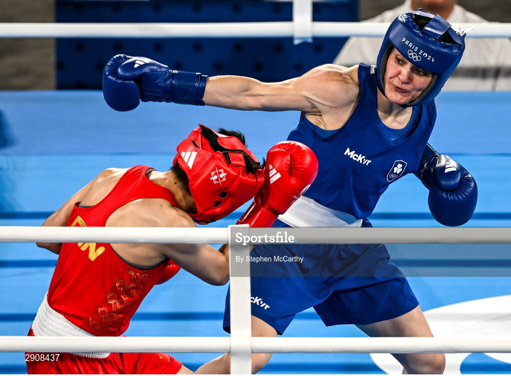 6 August 2024; Kellie Harrington of Team Ireland, right, and Wenlu Yang of Team People's Republic of China during their women's 60kg final bout at Court Philippe-Chatrier in Roland Garros Stadium during the 2024 Paris Summer Olympic Games in Paris, France. Photo by Stephen McCarthy/Sportsfile