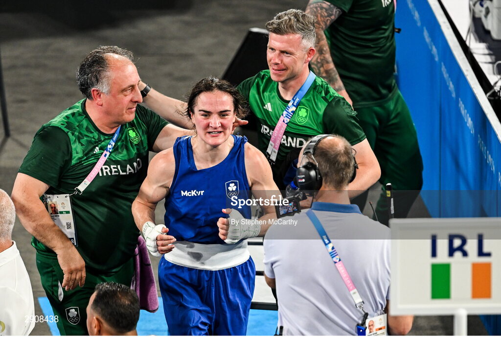 6 August 2024; Kellie Harrington of Team Ireland with coaches Zaur Antia, left, and James Doyle after winning her women's 60kg final bout against Wenlu Yang of Team People's Republic of China at Court Philippe-Chatrier in Roland Garros Stadium during the 2024 Paris Summer Olympic Games in Paris, France. Photo by Stephen McCarthy/Sportsfile