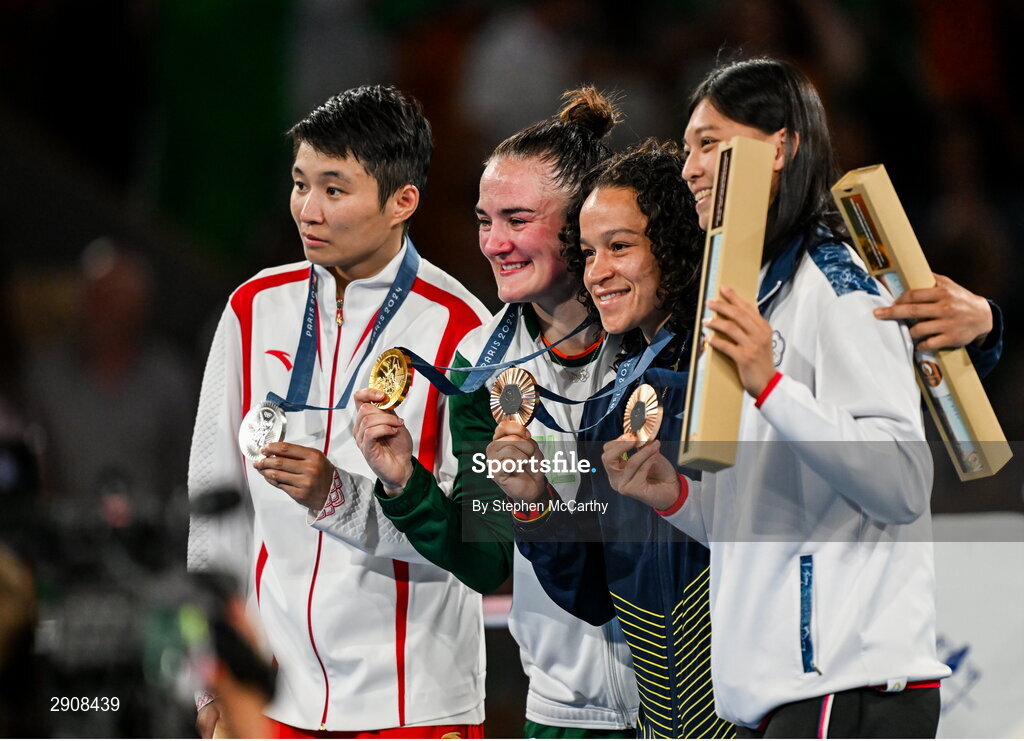 6 August 2024; The women's 60kg podium, from left to right, Silver medalist Wenlu Yang of Team People's Republic of China, Gold medalist Kellie Harrington of Team Ireland, Bronze medalists Beatriz Soares Ferreira of Team Brazil, and Shih Yi Wu of Team Chinese Taipei, at Court Philippe-Chatrier in Roland Garros Stadium during the 2024 Paris Summer Olympic Games in Paris, France. Photo by Stephen McCarthy/Sportsfile