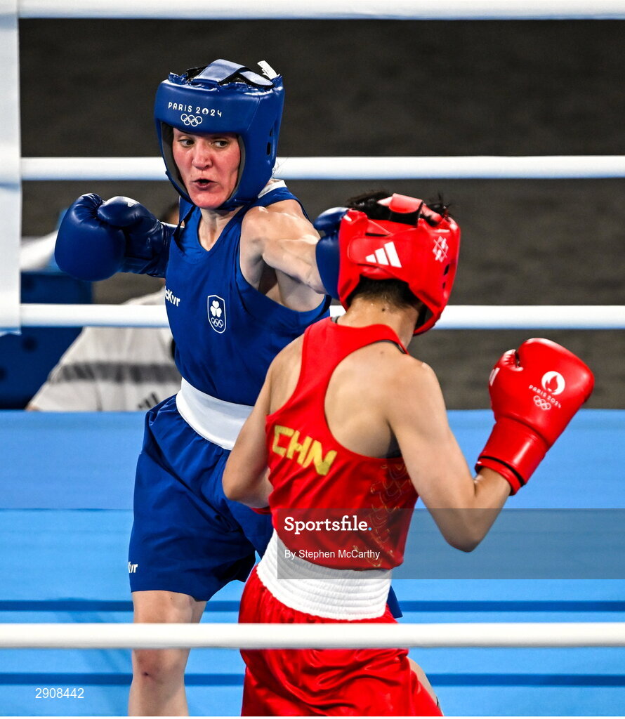 6 August 2024; Kellie Harrington of Team Ireland, left, and Wenlu Yang of Team People's Republic of China during their women's 60kg final bout at Court Philippe-Chatrier in Roland Garros Stadium during the 2024 Paris Summer Olympic Games in Paris, France. Photo by Stephen McCarthy/Sportsfile