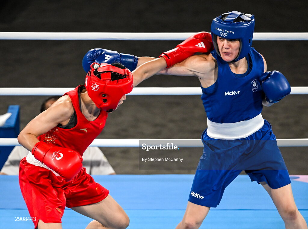 6 August 2024; Kellie Harrington of Team Ireland, right, and Wenlu Yang of Team People's Republic of China during their women's 60kg final bout at Court Philippe-Chatrier in Roland Garros Stadium during the 2024 Paris Summer Olympic Games in Paris, France. Photo by Stephen McCarthy/Sportsfile