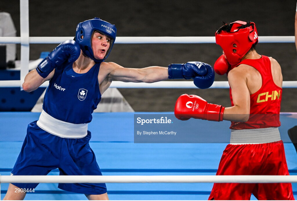 6 August 2024; Kellie Harrington of Team Ireland, left, and Wenlu Yang of Team People's Republic of China during their women's 60kg final bout at Court Philippe-Chatrier in Roland Garros Stadium during the 2024 Paris Summer Olympic Games in Paris, France. Photo by Stephen McCarthy/Sportsfile