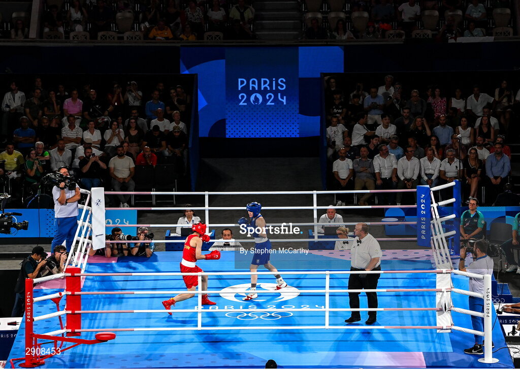 6 August 2024; Kellie Harrington of Team Ireland, right, and Wenlu Yang of Team People's Republic of China during their women's 60kg final bout at Court Philippe-Chatrier in Roland Garros Stadium during the 2024 Paris Summer Olympic Games in Paris, France. Photo by Stephen McCarthy/Sportsfile
