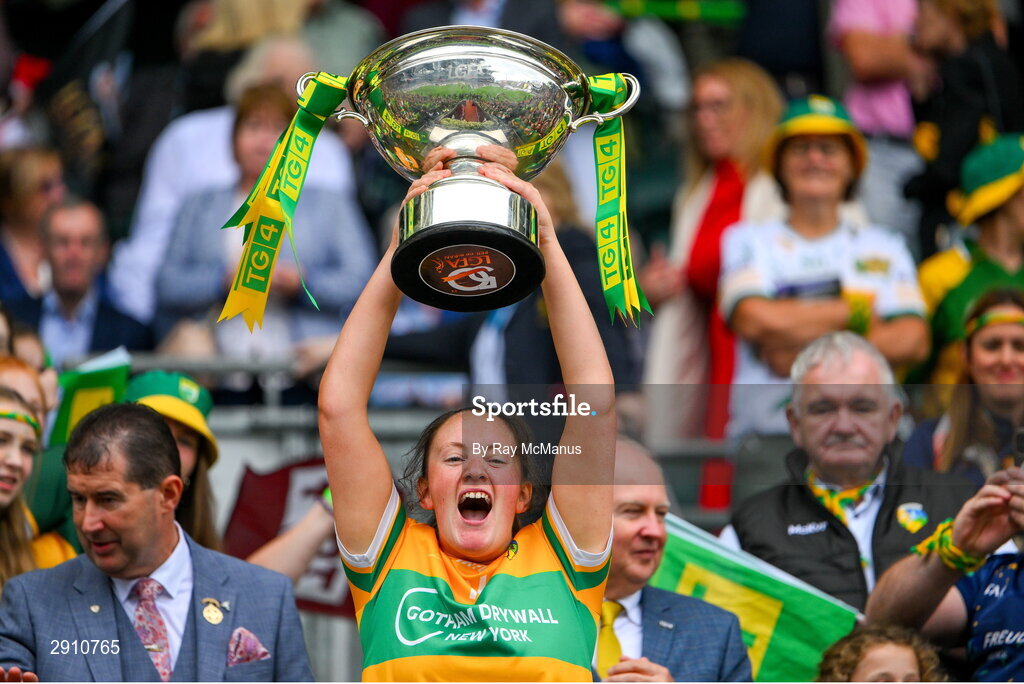 4 August 2024; Leitrim goalkeeper Michelle Hackett lifts the cup after her side's victory in the TG4 All-Ireland Ladies Football Intermediate Championship final match between Leitrim and Tyrone at Croke Park, Dublin. Photo by Ray McManus/Sportsfile