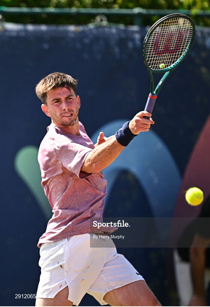 9 August 2024; Conor Gannon of Ireland in action against Filip Pieczonka of Poland during their men's singles quarter-final match on day four of the AIG Irish Open Tennis Championships at Carrickmines Croquet Lawn & Tennis Club in Dublin. Photo by Harry Murphy/Sportsfile