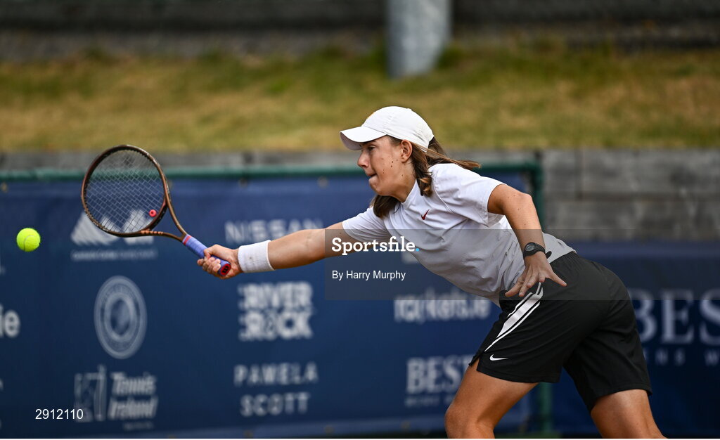 9 August 2024; Chloe Noel of France in action against Karola Patricia Bejenaru of Romania during their women's singles quarter-final match on day four of the AIG Irish Open Tennis Championships at Carrickmines Croquet Lawn & Tennis Club in Dublin. Photo by Harry Murphy/Sportsfile