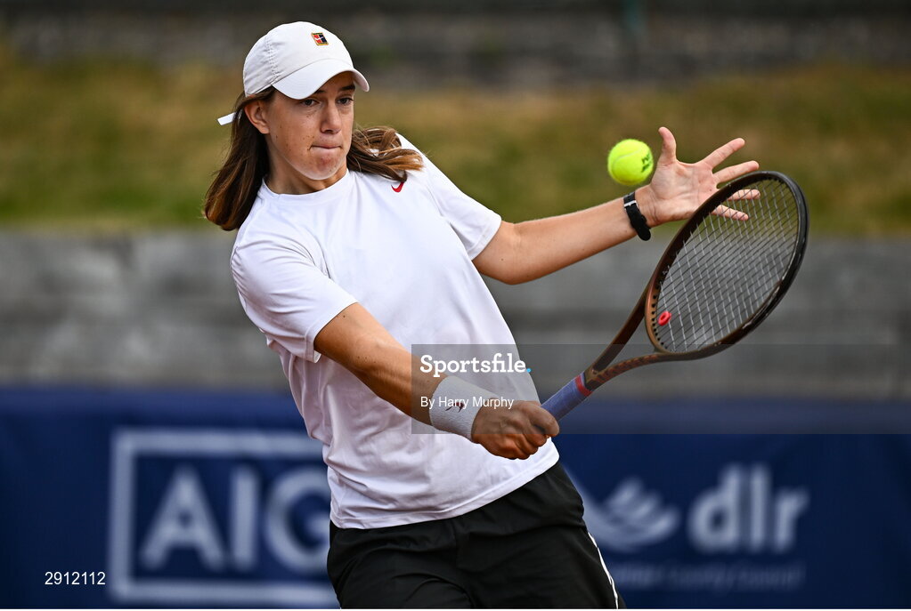 9 August 2024; Chloe Noel of France in action against Karola Patricia Bejenaru of Romania during their women's singles quarter-final match on day four of the AIG Irish Open Tennis Championships at Carrickmines Croquet Lawn & Tennis Club in Dublin. Photo by Harry Murphy/Sportsfile