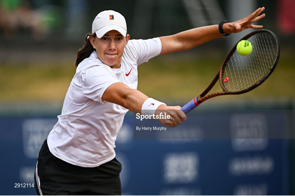9 August 2024; Chloe Noel of France in action against Karola Patricia Bejenaru of Romania during their women's singles quarter-final match on day four of the AIG Irish Open Tennis Championships at Carrickmines Croquet Lawn & Tennis Club in Dublin. Photo by Harry Murphy/Sportsfile