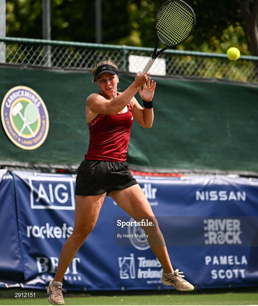 9 August 2024; Ella Haavisto of Finland in action against Megan Davies of Great Britain during their women's singles quarter-final match on day four of the AIG Irish Open Tennis Championships at Carrickmines Croquet Lawn & Tennis Club in Dublin. Photo by Harry Murphy/Sportsfile