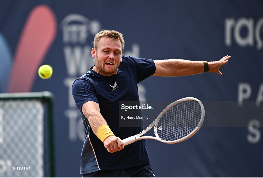 9 August 2024; Finn Bass of Great Britain in action against Brian  Bozemoj of Netherlands during their men's singles quarter-final match on day four of the AIG Irish Open Tennis Championships at Carrickmines Croquet Lawn & Tennis Club in Dublin. Photo by Harry Murphy/Sportsfile
