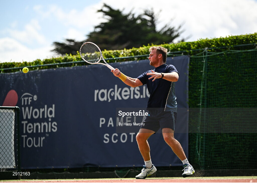 9 August 2024; Finn Bass of Great Britain in action against Brian  Bozemoj of Netherlands during their men's singles quarter-final match on day four of the AIG Irish Open Tennis Championships at Carrickmines Croquet Lawn & Tennis Club in Dublin. Photo by Harry Murphy/Sportsfile