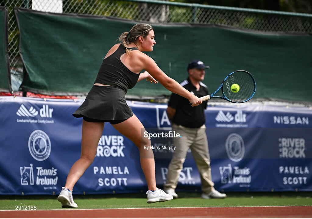 9 August 2024; Megan Davies of Great Britain in action against Ella Haavisto of Finland during their women's singles quarter-final match on day four of the AIG Irish Open Tennis Championships at Carrickmines Croquet Lawn & Tennis Club in Dublin. Photo by Harry Murphy/Sportsfile