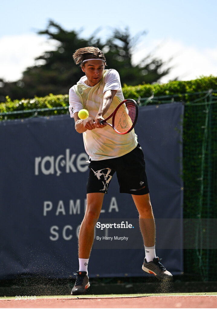 9 August 2024; Brian Bozemoj of Netherlands in action against Finn Bass of Great Britainduring their men's singles quarter-final match on day four of the AIG Irish Open Tennis Championships at Carrickmines Croquet Lawn & Tennis Club in Dublin. Photo by Harry Murphy/Sportsfile