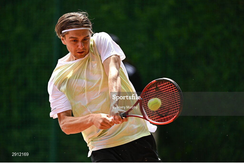 9 August 2024; Brian Bozemoj of Netherlands in action against Finn Bass of Great Britainduring their men's singles quarter-final match on day four of the AIG Irish Open Tennis Championships at Carrickmines Croquet Lawn & Tennis Club in Dublin. Photo by Harry Murphy/Sportsfile