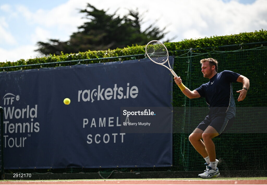 9 August 2024; Finn Bass of Great Britain in action against Brian  Bozemoj of Netherlands during their men's singles quarter-final match on day four of the AIG Irish Open Tennis Championships at Carrickmines Croquet Lawn & Tennis Club in Dublin. Photo by Harry Murphy/Sportsfile