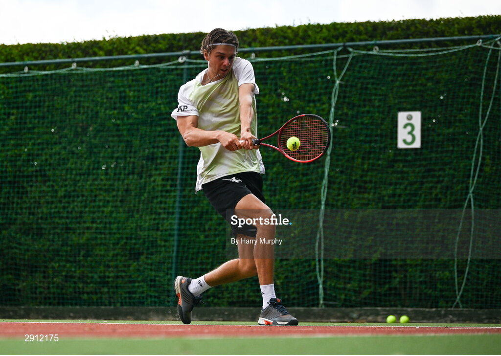 9 August 2024; Brian Bozemoj of Netherlands in action against Finn Bass of Great Britain during their men's singles quarter-final match on day four of the AIG Irish Open Tennis Championships at Carrickmines Croquet Lawn & Tennis Club in Dublin. Photo by Harry Murphy/Sportsfile