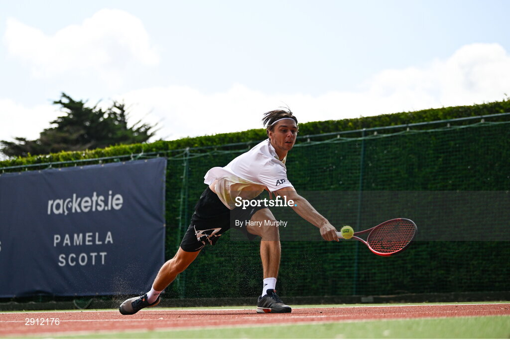 9 August 2024; Brian Bozemoj of Netherlands in action against Finn Bass of Great Britain during their men's singles quarter-final match on day four of the AIG Irish Open Tennis Championships at Carrickmines Croquet Lawn & Tennis Club in Dublin. Photo by Harry Murphy/Sportsfile