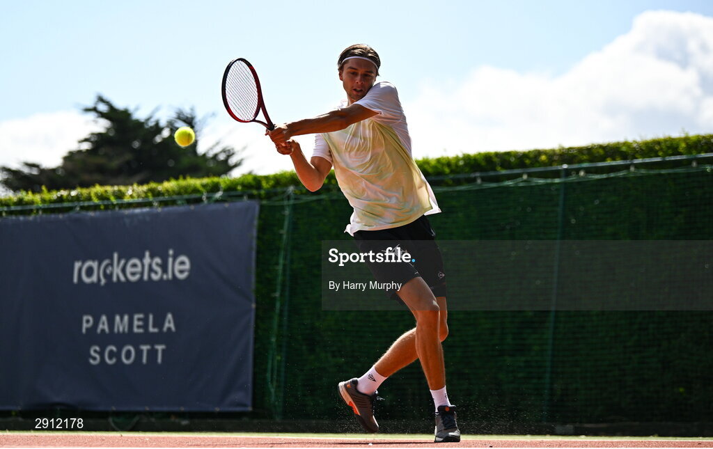 9 August 2024; Brian Bozemoj of Netherlands in action against Finn Bass of Great Britain during their men's singles quarter-final match on day four of the AIG Irish Open Tennis Championships at Carrickmines Croquet Lawn & Tennis Club in Dublin. Photo by Harry Murphy/Sportsfile