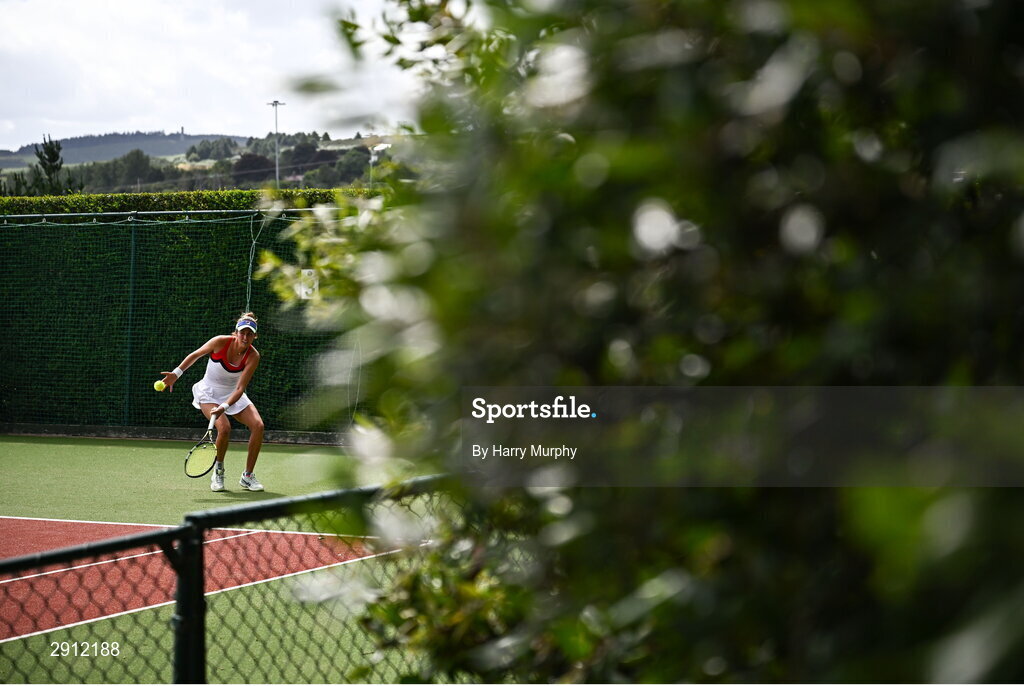 9 August 2024; India Houghton of United States in action against Alice Gillan of Great Britain during their women's singles quarter-final match on day four of the AIG Irish Open Tennis Championships at Carrickmines Croquet Lawn & Tennis Club in Dublin. Photo by Harry Murphy/Sportsfile