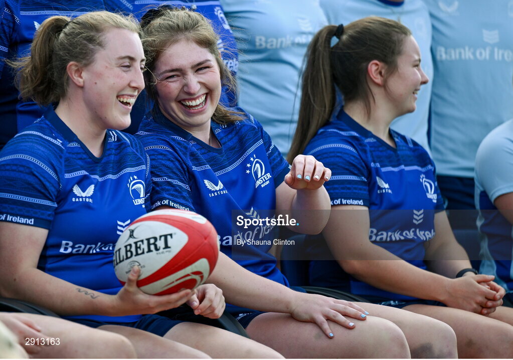 9 August 2024; Molly Boyne, left, shares a joke with team-mate Aoife Moore, centre, during the Leinster Rugby women's jersey presentation at Energia Park in Dublin. Photo by Shauna Clinton/Sportsfile