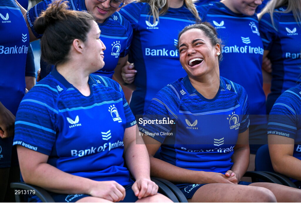 9 August 2024; Christy Haney, left, shares a joke with team-mate Eimear Corri during the Leinster Rugby women's jersey presentation at Energia Park in Dublin. Photo by Shauna Clinton/Sportsfile