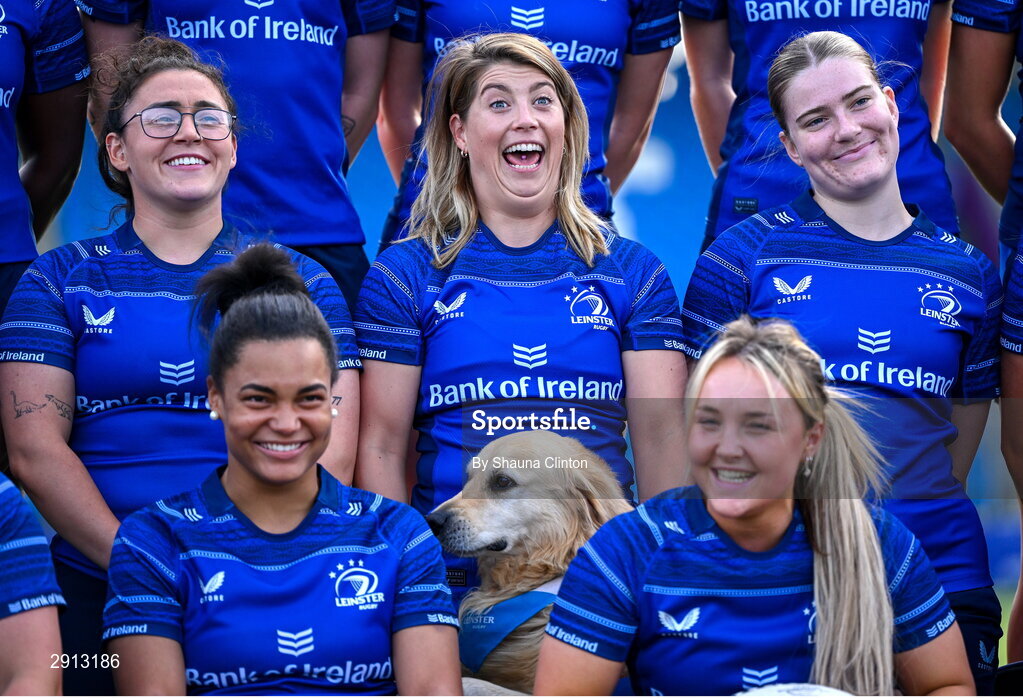 9 August 2024; Leinster players, back row, from left, Aimee Clarke, Ailsa Hughes, Cara Martin, with, front row, Eimear Corri, left, and Aoife Dalton, alongside TJ the Dog, centre, during the Leinster Rugby women's jersey presentation at Energia Park in Dublin. Photo by Shauna Clinton/Sportsfile