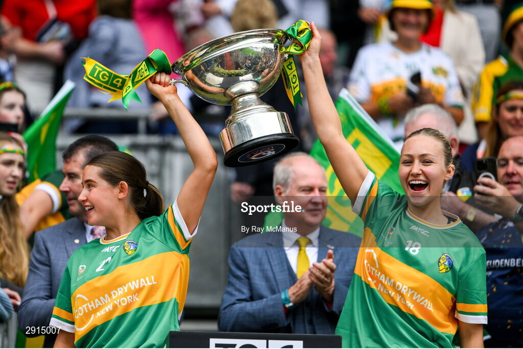 4 August 2024; Mollie Murphy and Lauryn McKeon, right, of Leitrim lift the Mary Quinn Memorial cup after the TG4 All-Ireland Ladies Football Intermediate Championship final match between Leitrim and Tyrone at Croke Park, Dublin. Photo by Ray McManus/Sportsfile