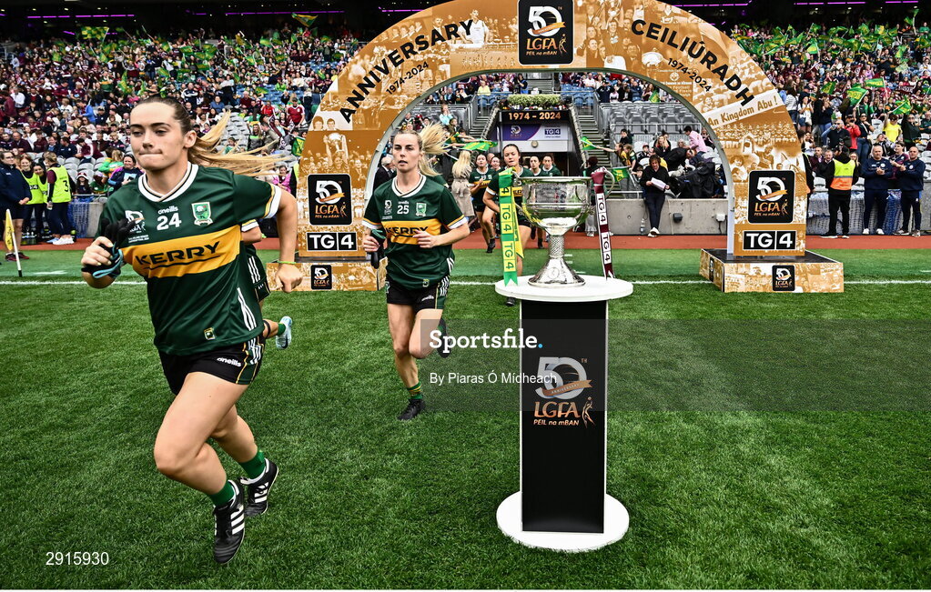 4 August 2024; Ciara McCarthy of Kerry runs past the Brendan Martin Cup before the TG4 All-Ireland Ladies Football Senior Championship final match between Galway and Kerry at Croke Park in Dublin. Photo by Piaras Ó Mídheach/Sportsfile