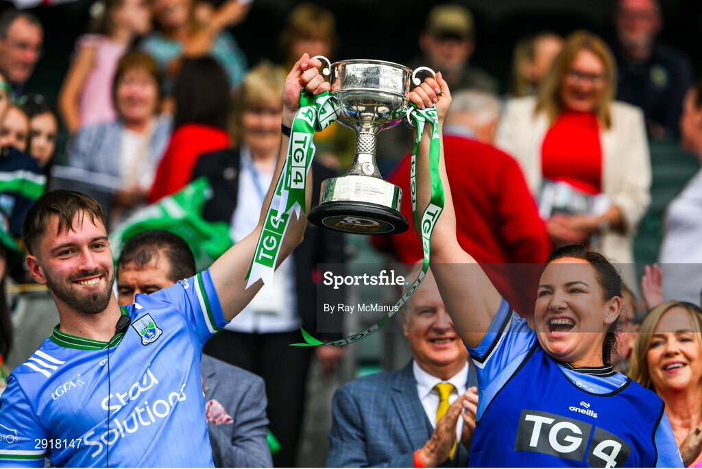 4 August 2024; Conor McGovern and Tanya Rhatigan of Fermanagh lift the West County Hotel cup after the TG4 All-Ireland Ladies Junior Football Championship final match between Fermanagh and Louth at Croke Park, Dublin. Photo by Ray McManus/Sportsfile
