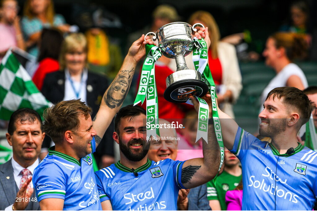 4 August 2024; Mark Gallagher, Kane Connor, and Conor McGovern of Fermanagh lift the West County Hotel cup after the TG4 All-Ireland Ladies Junior Football Championship final match between Fermanagh and Louth at Croke Park, Dublin. Photo by Ray McManus/Sportsfile