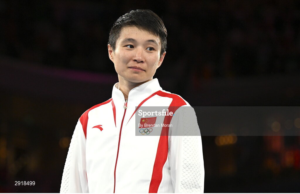 6 August 2024; Silver medallist Wenlu Yang of Team People's Republic of China awaits to receive her medal after her women's 60kg final bout at Court Philippe-Chatrier in Roland Garros Stadium during the 2024 Paris Summer Olympic Games in Paris, France. Photo by Brendan Moran/Sportsfile