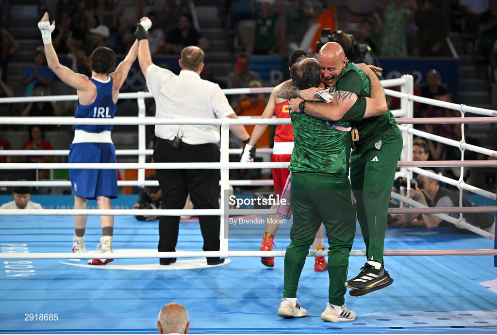 6 August 2024; Team Ireland coaches Zaur Antia, left, and Damian Kennedy celebrate after Kellie Harrington defeated Wenlu Yang of Team People's Republic of China in their women's 60kg final bout at Court Philippe-Chatrier in Roland Garros Stadium during the 2024 Paris Summer Olympic Games in Paris, France. Photo by Brendan Moran/Sportsfile