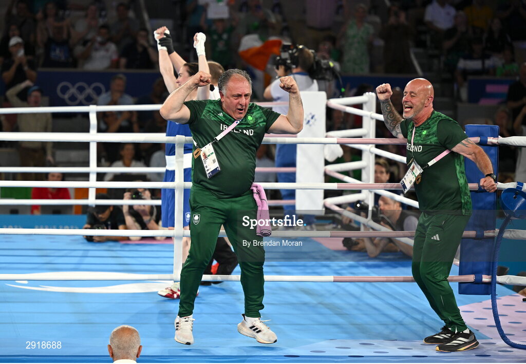 6 August 2024; Team Ireland coaches Zaur Antia, left, and Damian Kennedy celebrate after Kellie Harrington defeated Wenlu Yang of Team People's Republic of China in their women's 60kg final bout at Court Philippe-Chatrier in Roland Garros Stadium during the 2024 Paris Summer Olympic Games in Paris, France. Photo by Brendan Moran/Sportsfile
