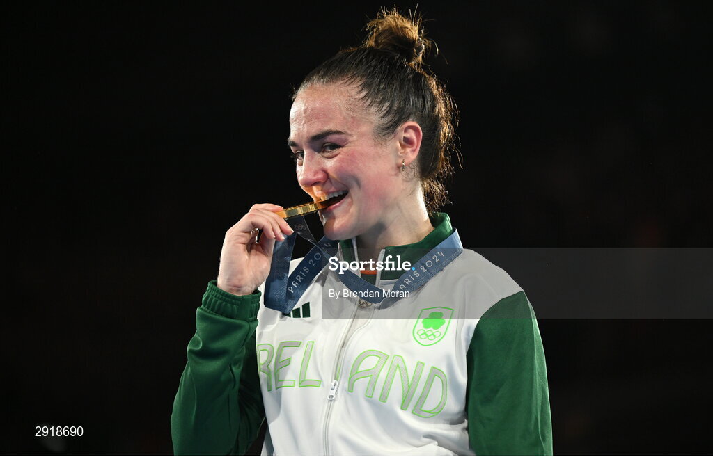 6 August 2024; Kellie Harrington of Team Ireland celebrates with her gold medal after defeating Wenlu Yang of Team People's Republic of China in their women's 60kg final bout  at Court Philippe-Chatrier in Roland Garros Stadium during the 2024 Paris Summer Olympic Games in Paris, France. Photo by Brendan Moran/Sportsfile Photo by Brendan Moran/Sportsfile
