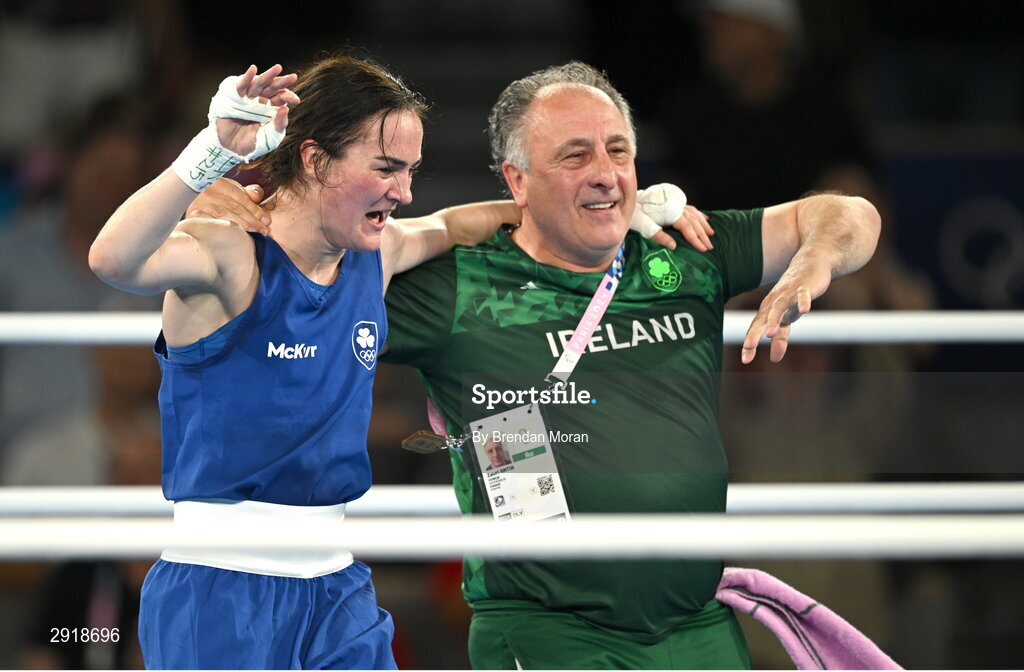 6 August 2024; Kellie Harrington of Team Ireland celebrates with head coach Zaur Antia after defeating Wenlu Yang of Team People's Republic of China in their women's 60kg final bout at Court Philippe-Chatrier in Roland Garros Stadium during the 2024 Paris Summer Olympic Games in Paris, France. Photo by Brendan Moran/Sportsfile