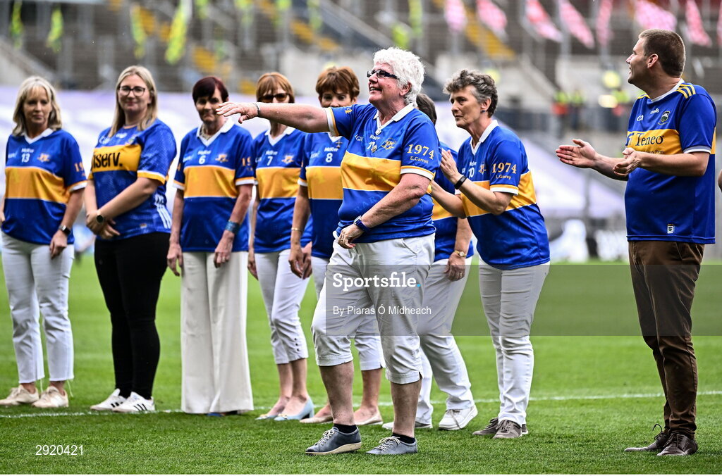 4 August 2024; Eleanor Carroll, from Ardfinnan, of the Tipperary team of 1974, who won the first All-Ireland Ladies Senior Football Championship final, as they are introduced to the crowd at half-time during the TG4 All-Ireland Ladies Football Intermediate Championship final match between Leitrim and Tyrone at Croke Park in Dublin. Photo by Piaras Ó Mídheach/Sportsfile