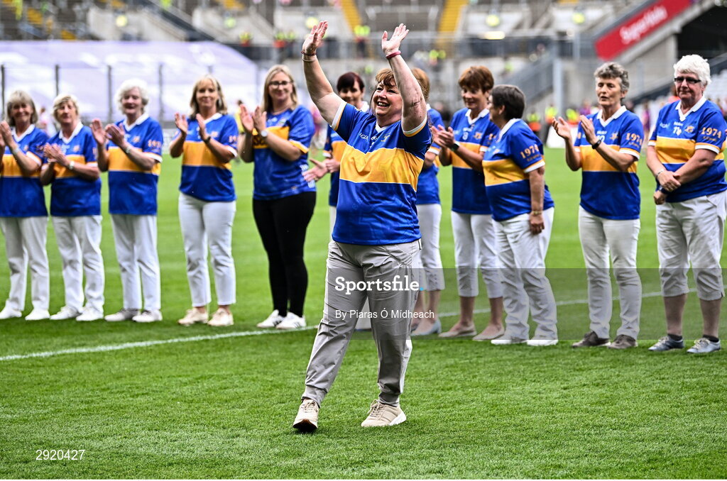 4 August 2024; Josie Keane, from Mullinahone, of the Tipperary team of 1974, who won the first All-Ireland Ladies Senior Football Championship final, as they are introduced to the crowd at half-time during the TG4 All-Ireland Ladies Football Intermediate Championship final match between Leitrim and Tyrone at Croke Park in Dublin. Photo by Piaras Ó Mídheach/Sportsfile
