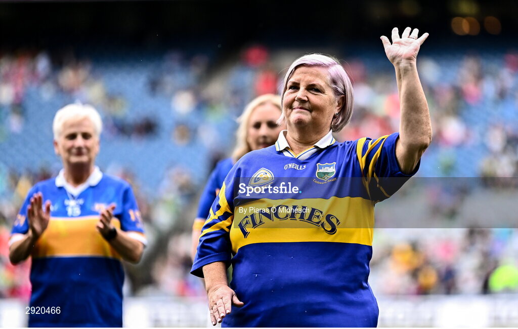 4 August 2024; Ena Hackett from Newcastle, represented today by her relative, Mary Strappe, of the Tipperary team of 1974, who won the first All-Ireland Ladies Senior Football Championship final, as they are introduced to the crowd at half-time during the TG4 All-Ireland Ladies Football Intermediate Championship final match between Leitrim and Tyrone at Croke Park in Dublin. Photo by Piaras Ó Mídheach/Sportsfile